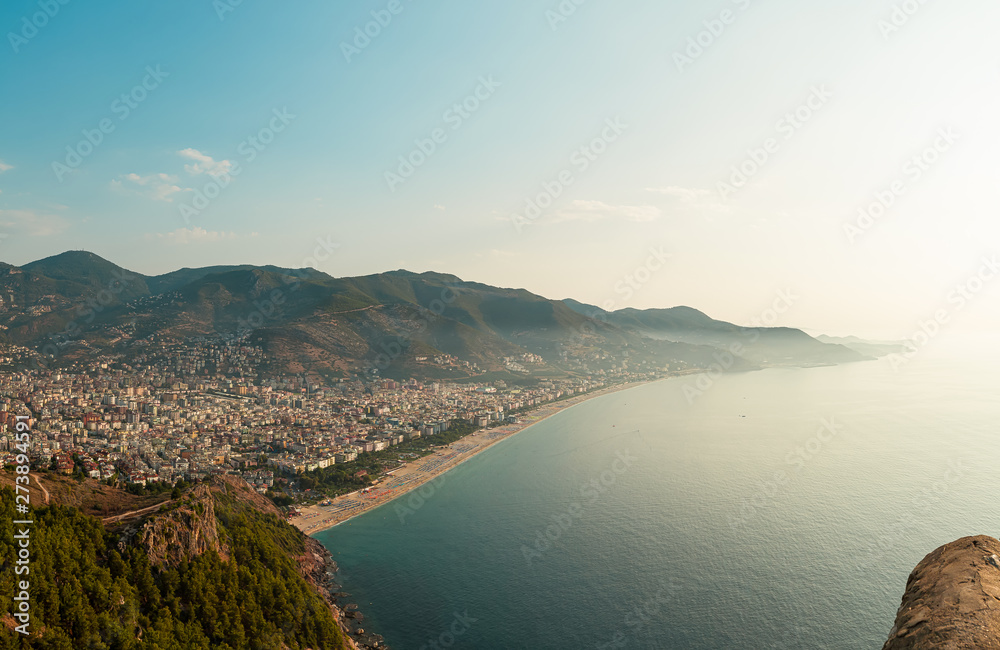 Panorama of the old town overlooking the beach. View of the resort town. Alanya is popular tourist destination in Turkey. Panorama in high resolution observed from Fortress of Alanya