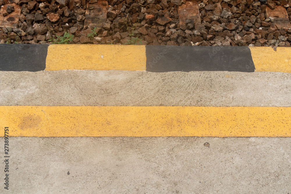 Fototapeta premium black and yellow line on the floor