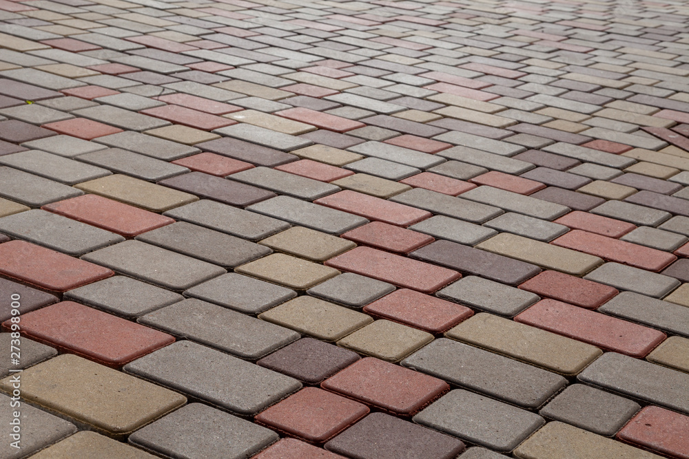 Fototapeta premium Photo of multi-colored paving stones pattern and background
