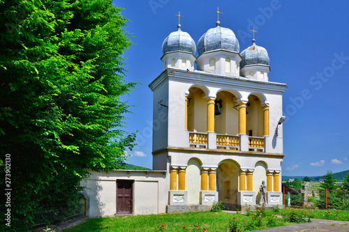 Belfry in the immediate vicinity of the church in Jurowce near Sanok, Poland, voivodeship podkarpackie.  photo