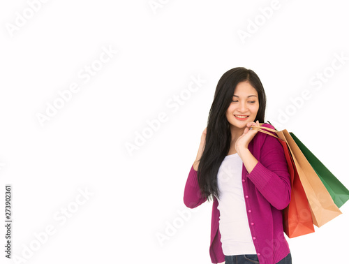 Asian beautiful woman smiles happily with shopping Beautiful woman carrying shopping bags on a white background.