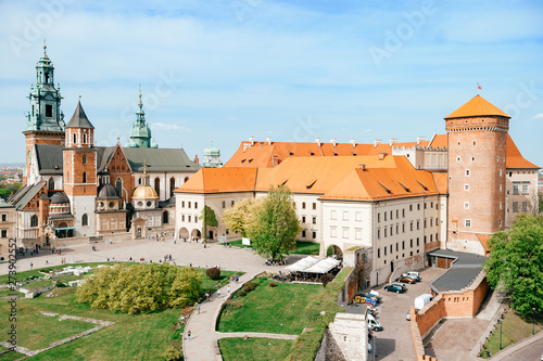 Krakow, Poland - April 26, 2019: view at wawel castle with tourists.