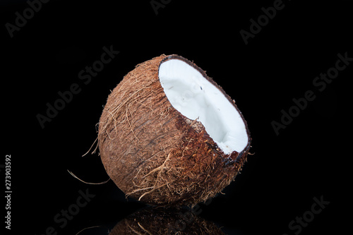 tropical coconut on a black background