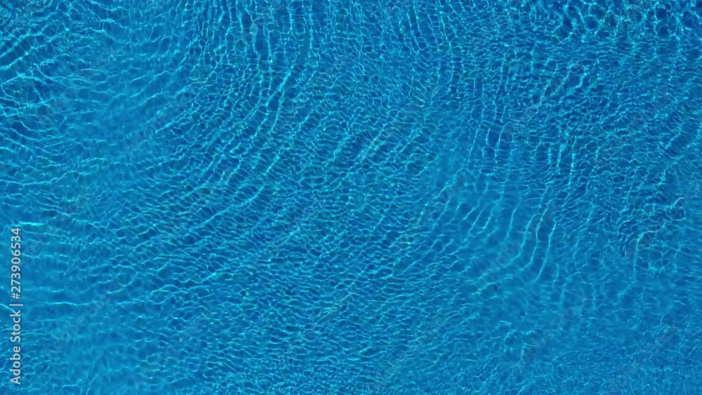 Topview from a drone over the surface of the pool Topview from a drone over the surface of the pool