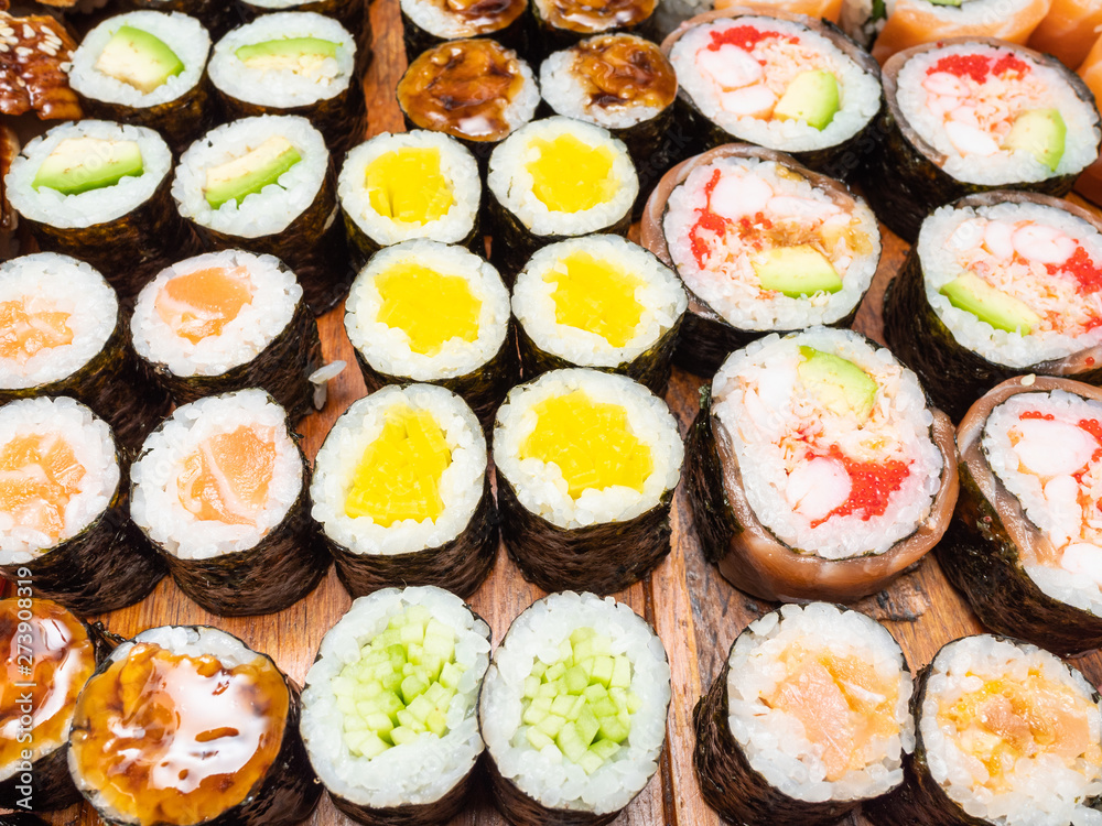 above view of different of sushi and rolls above view of different of sushi and rolls