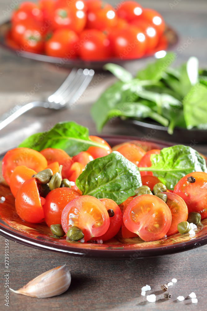 Fresh cherry tomatoes salad and ingredients Fresh cherry tomatoes salad and ingredients