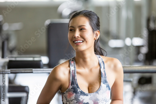 Free Download Young Woman Lifting Dumbbell or exercise In Gym - GFXLoad