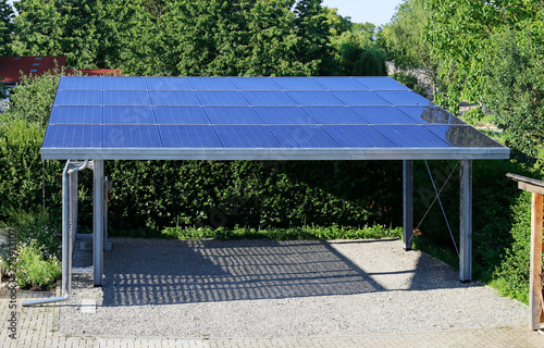 New carport with semi transparent photovoltaik moduls photo