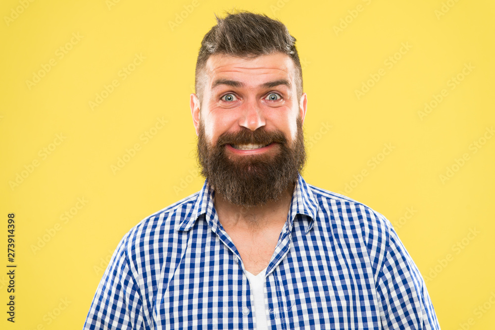Fototapeta premium Because everyone deserves to smile. Happy man on yellow background. Bearded man smiling. Caucasian man with mustache and beard hair on unshaven face. Brutal man with long beard and stylish haircut