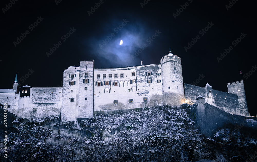 Fortress of Salzburg and the moon: Winterly in the night. Fortress of Salzburg and the moon: Winterly in the night.