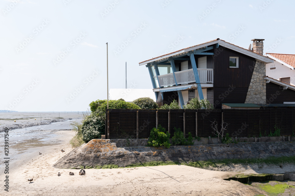 House in sand beach of Basin Arcachon in Andernos city
