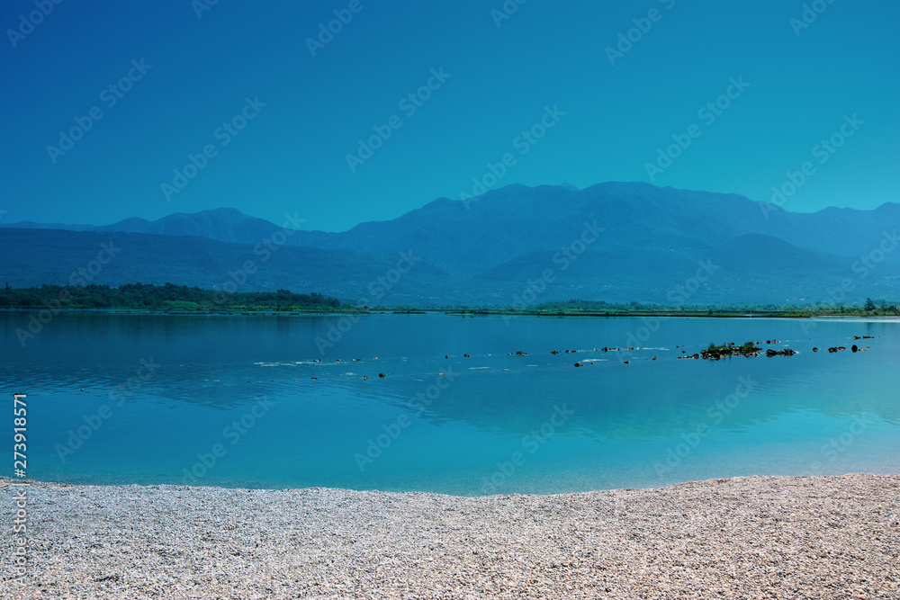 view of the mountains in montenegro coastal sea with blue sky