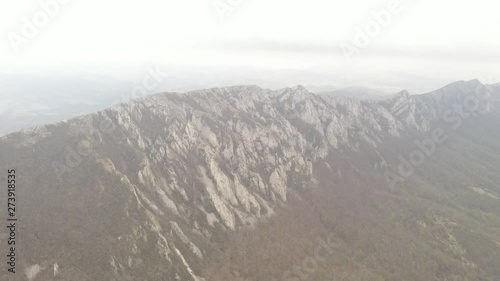 Misty morning over the ridge of Veliki Krsh mountain 4K drone video photo