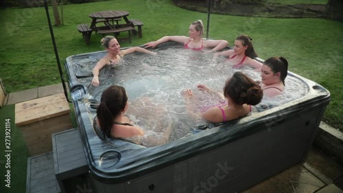 Friends Relaxing in a Hot Tub