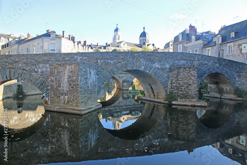 Segre Bridge reflected in the River Oudon, France photo