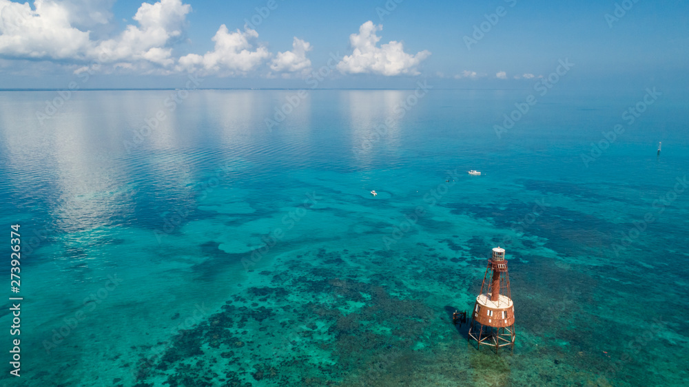 Aerial of Carysfort Reef Lighthouse in Florida Keys - obrazy, fototapety, plakaty 