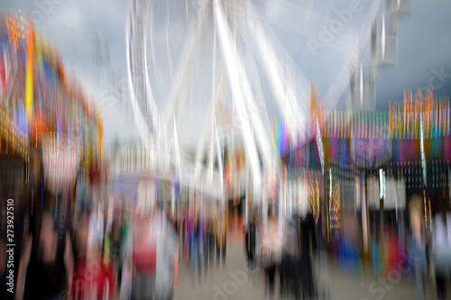 Abstract background of people on a funfair - Stockphoto