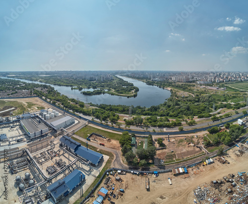 Moscow oil refinery in Kapotnya district, Russia. Industrial pipes and tanks of oil refinery factory. Aerial drone view