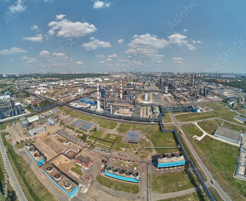 Moscow oil refinery in Kapotnya district, Russia. Industrial pipes and tanks of oil refinery factory. Aerial drone view