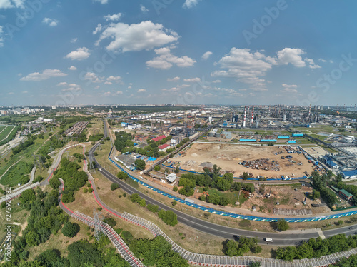 Moscow oil refinery in Kapotnya district, Russia. Industrial pipes and tanks of oil refinery factory. Aerial drone view