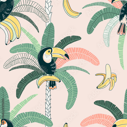 Toucan vector color seamless pattern. Jungle flora and fauna background. Fruit eating bird. Rainforest palm and banana. Exotic bird. Decorative tropical textile, wallpaper, wrapping paper design