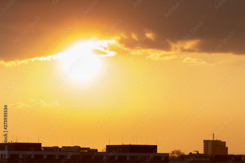 Cityscape and sunset with silhouettes of houses. Cityscape and sunset with silhouettes of houses.