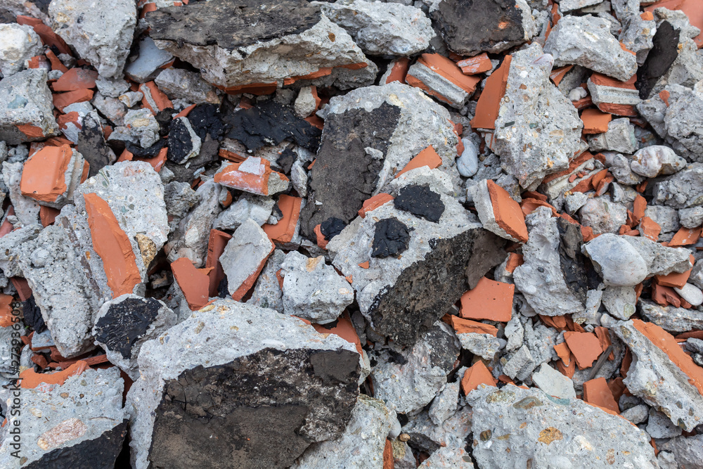 Broken Red Bricks and Pieces of Concrete of Ruined Building on The Ground Broken Red Bricks and Pieces of Concrete of Ruined Building on The Ground