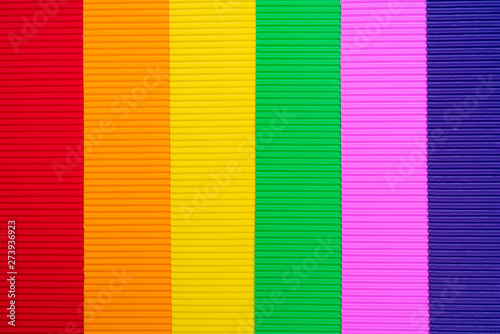 Colorful stripes background of corrugated paper. Soft focus. Copy space.