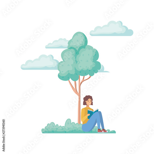 man sitting with book in landscape with trees and plants