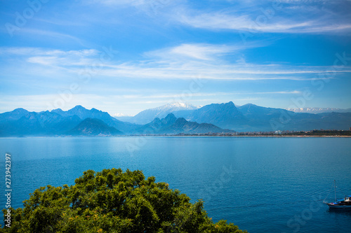 Beautiful landscape of mountains and ship in the Mediterranean sea in Turkey, Antalya. © Evgeniya Uvarova