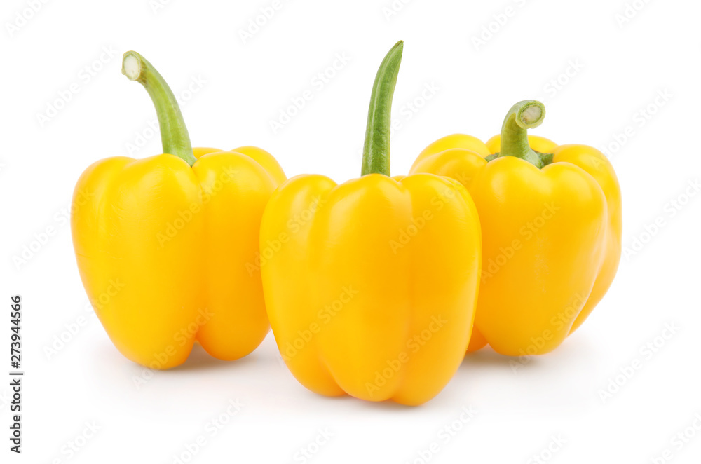 Ripe yellow bell peppers isolated on white Ripe yellow bell peppers isolated on white