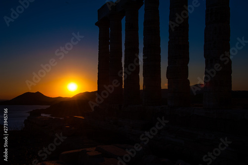 Ancient Greek temple of Poseidon / Neptune, at Cape Sounion near Athens, during sunset