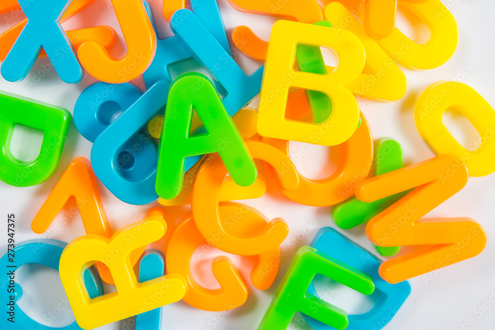 Fototapeta premium colorful letters stacked in a row