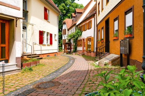 Narrow street in the old town of Amorbach in Lower Franconia, Bavaria, Germany photo