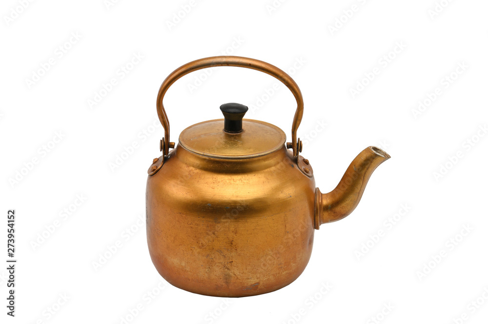 Golden metal kettle on a white background.Teapot. Golden metal kettle on a white background.Teapot.