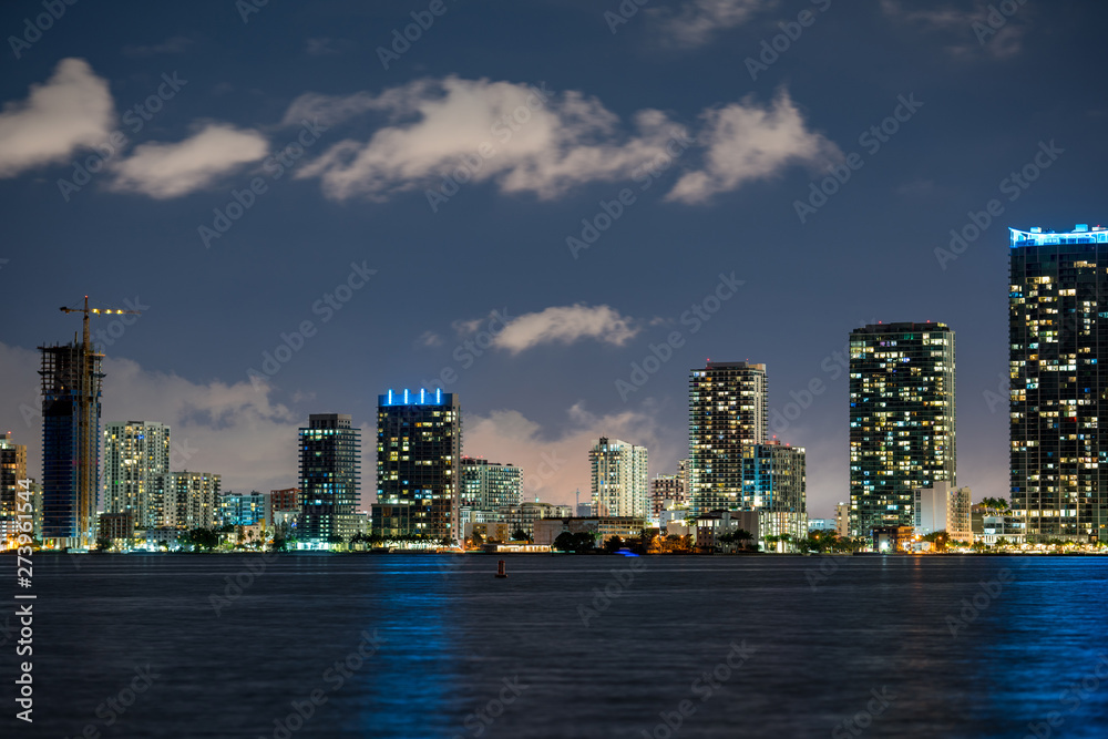 Edgewater Miami at night rolling clouds image