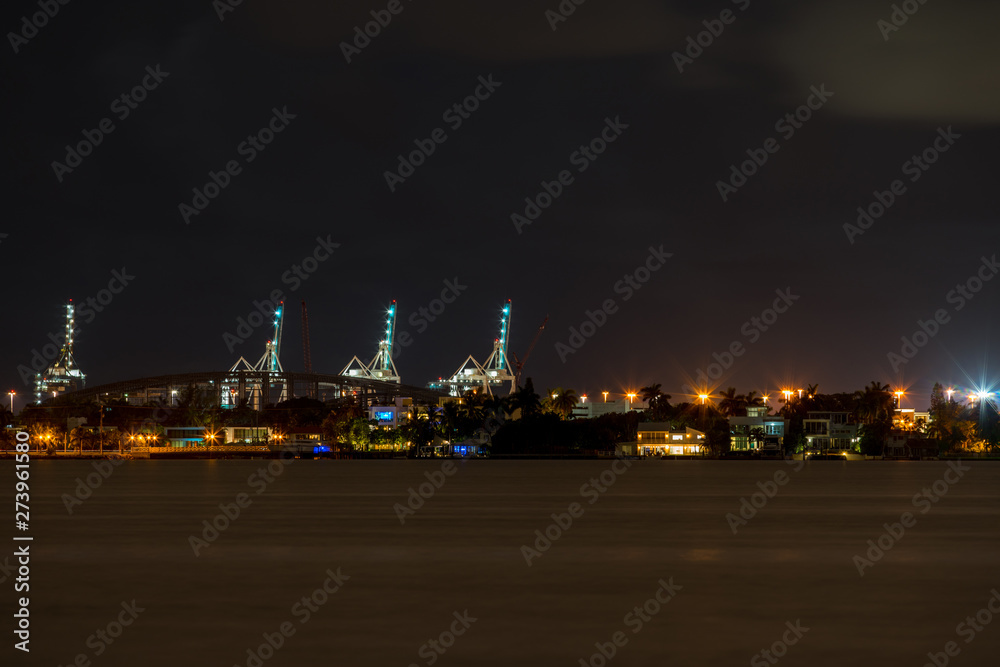 Night photo Port of Miami industrial cranes