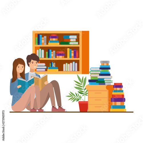couple with book in hands in living room
