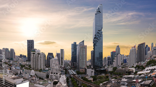 City scape of MahaNakhon building, skyscraper in the Silom/Sathon central business district of Bangkok as the tallest building in Thailand photo