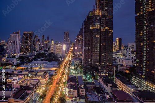 City scape of building, skyscraper in the Silom/Sathon central business district of Bangkok at night
