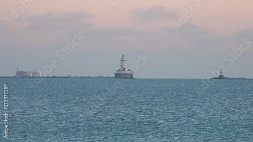 lighthouse in the distance early morning light sunrise Chicago lake Michigan 4k