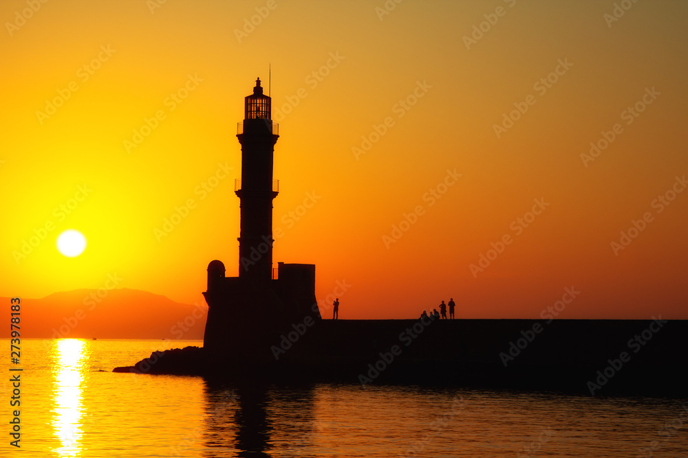 Lighthouse of Chania at ummer sunset , Crete , Greece Lighthouse of Chania at ummer sunset , Crete , Greece