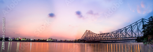 Panorama of Howrah bridge on river Ganges in kolkata city , India photo