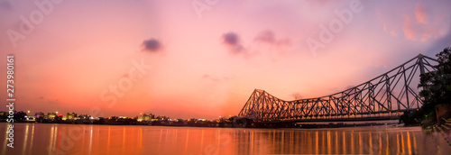Panorama of Howrah bridge on river Ganges in kolkata city , India photo