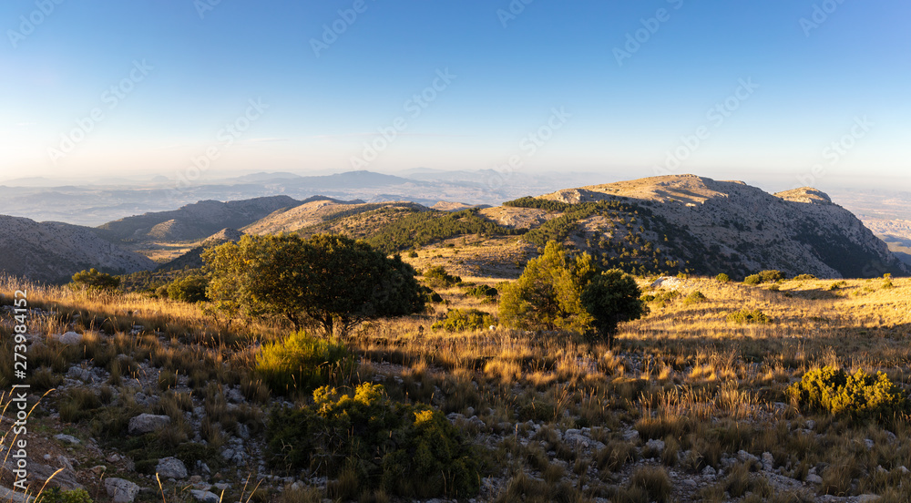 Obraz premium This mountain region is called Sierra Espuna. A panoramic view at sunset from the summit of Mount Morron in the Spanish region of Murcia to the north.