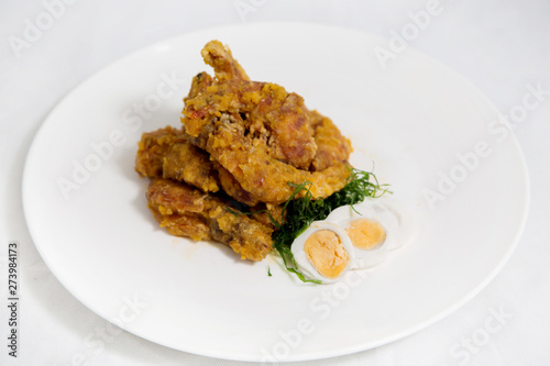 Crisp fried shrimps tempura with egg. Seafood tempura cuisine dish.