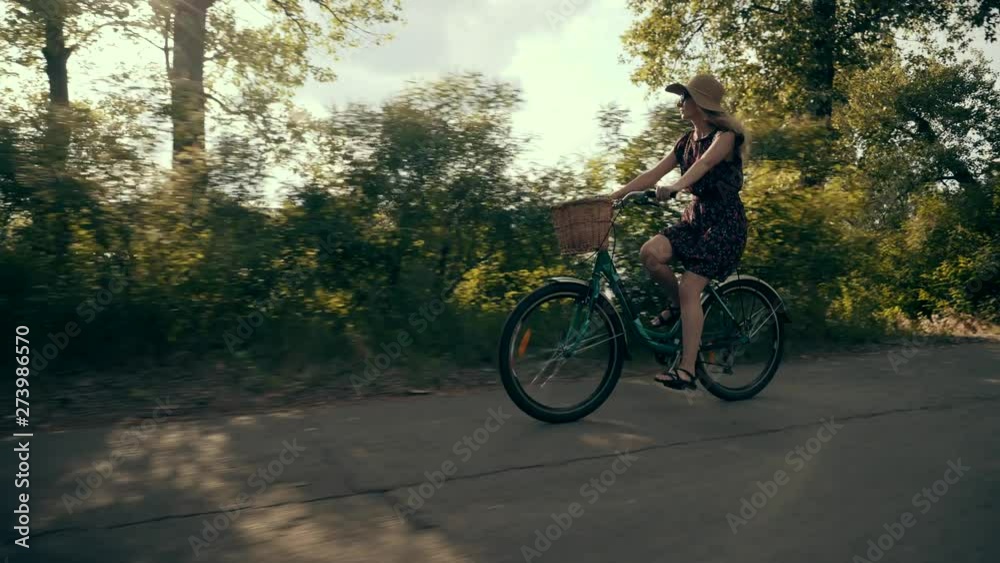 Cyclist Woman Cycling On Bicycle.Girl Cycling On Bike.Cyclist Beautiful Woman Wearing Dress Rides Bicycle.Happy Woman In Hat Riding On Bicycle.Pretty Girl On Bicycle.Woman With Blonde Hair Cycling Cyclist Woman Cycling On Bicycle.Girl Cycling On Bike.Cyclist Beautiful Woman Wearing Dress Rides Bicycle.Happy Woman In Hat Riding On Bicycle.Pretty Girl On Bicycle.Woman With Blonde Hair Cycling