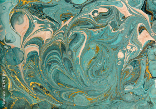 Blue and gold marbling pattern. Golden marble liquid texture.