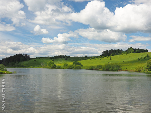Russian landscape: field and lake