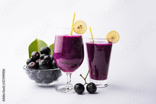 Juice of jamun fruit in a glass also called as java plum, jambolan plum, jambhul, syzygium cumini photo